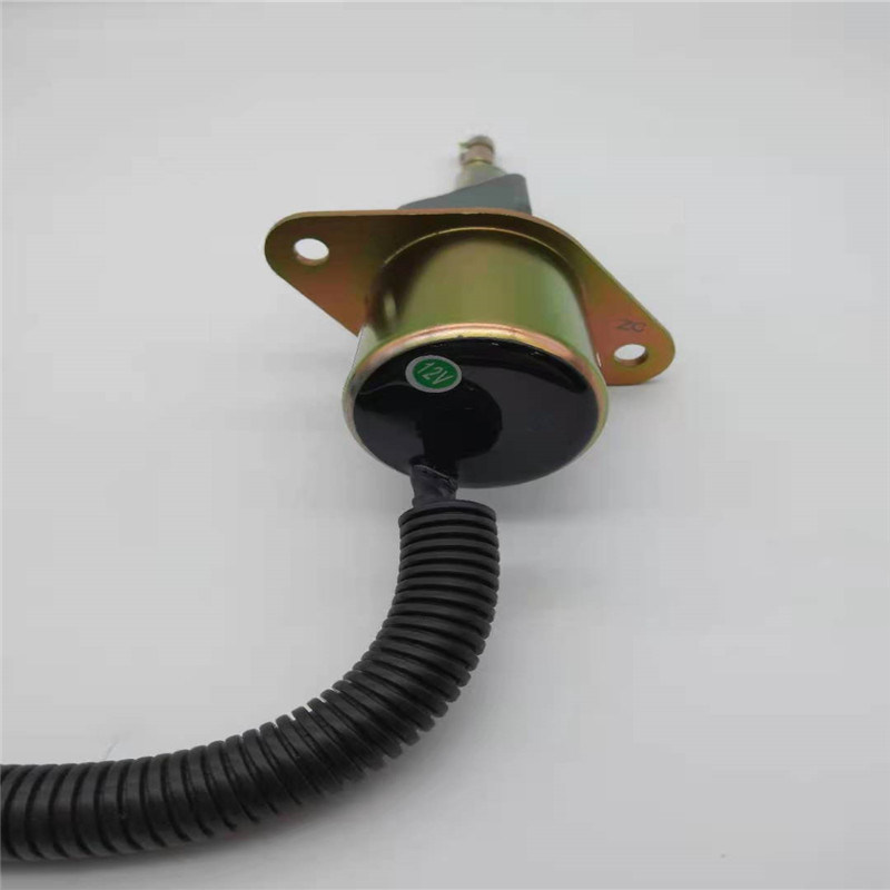 3928160 Zawór elektromagnetyczny zatrzymania pasujący do niwelatora terenu Cummins 6BTA5.9-M2 Część silnika