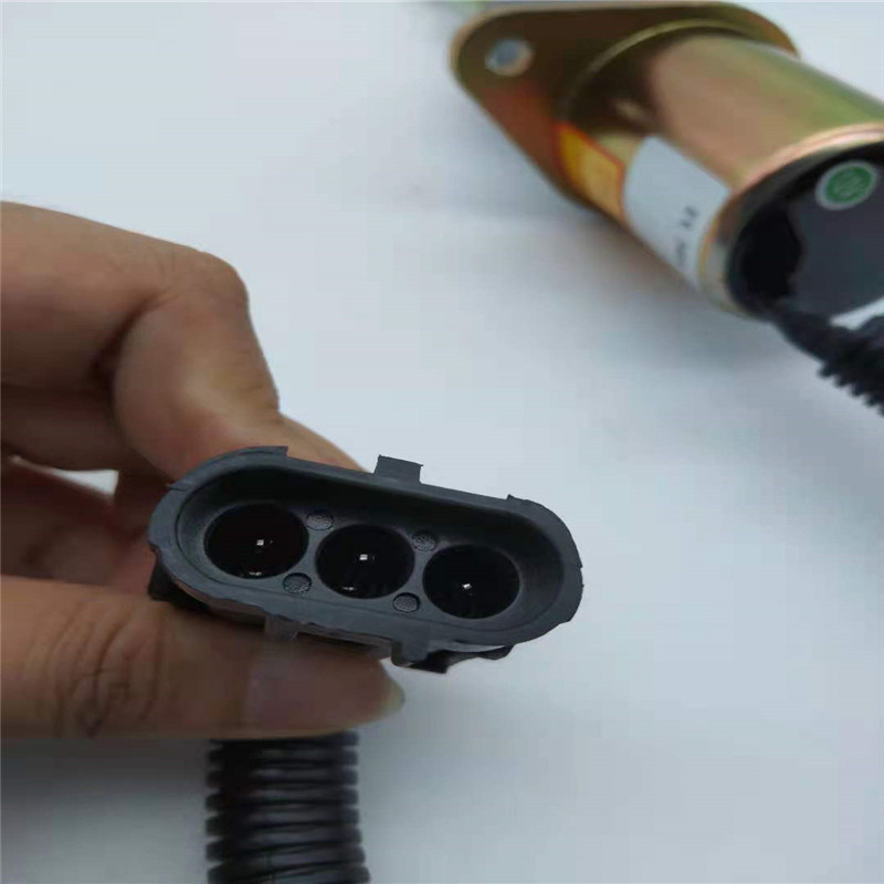 3928160 Zawór elektromagnetyczny zatrzymania pasujący do niwelatora terenu Cummins 6BTA5.9-M2 Część silnika
